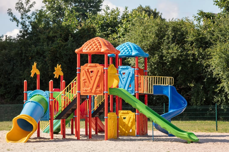 Outdoor playground equipment with slides
