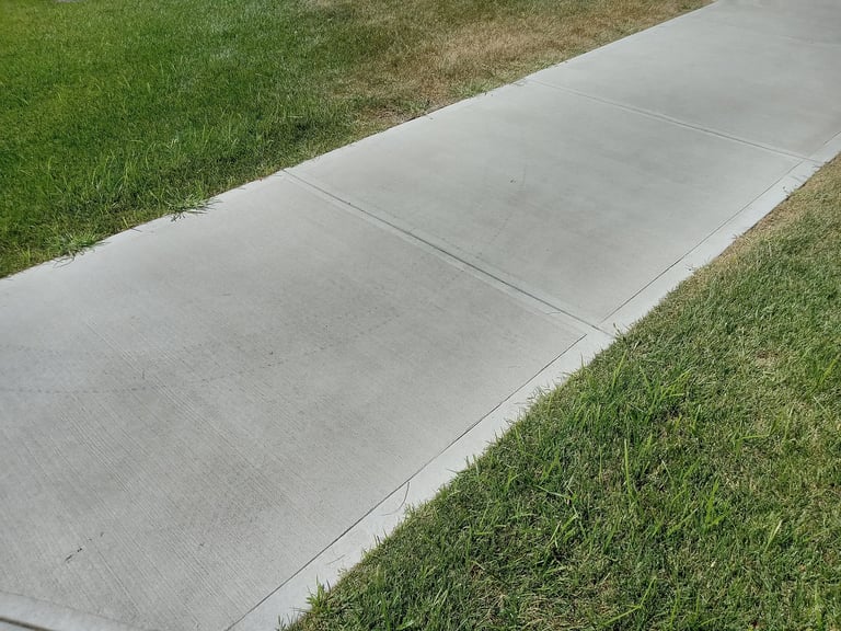 Concrete sidewalk cleaning